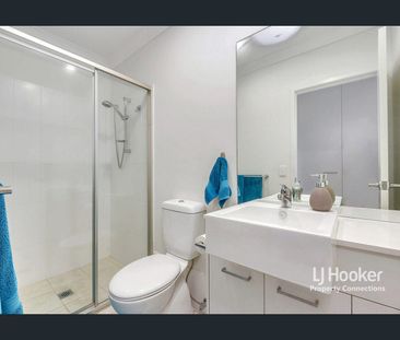 Sophisticated Two-Level Living with Private Balcony - Photo 5