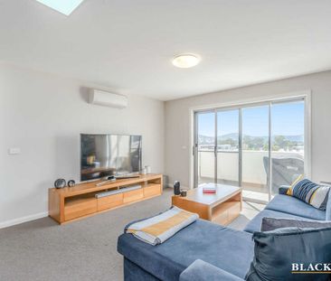 Top‑Floor Living Above It All at Ivy - Photo 3