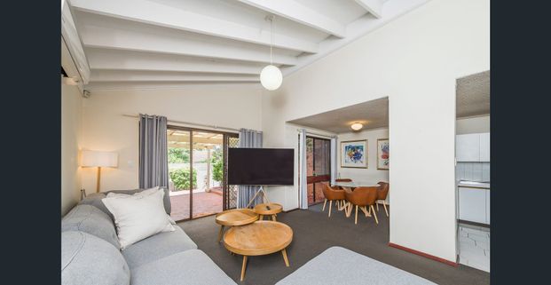 Partially Furnished Townhouse Retreat in Sought-After Como - Photo 1