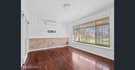 Located in Sought After Suburb - Neat & Tidy Family Home - Photo 3