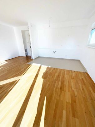 Balkonwohnung im 1. Obergeschoss - Foto 1