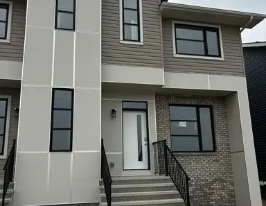 BRAND NEW MODERN 3 BEDROOM, 2.5 BATH DUPLEX IN LIVINGSTON, NW | Calgary - Photo 1