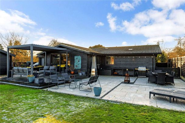 An immaculately presented, three double bedroom, three bathroom barn conversion with garage and outbuilding - Photo 1