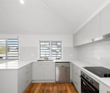 FRESHLY RENOVATED CHARACTER HOME WITH CITY VIEWS - Photo 3