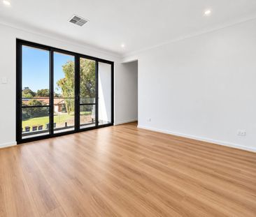 Spacious 4-Bedroom Family Home with Modern Comforts in Fulham - Photo 1