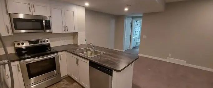 HALF Garage space + Basement Suite Available in Seton with Paved Sidewalk | Seton Manor SE, Calgary - Photo 1
