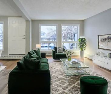 Spacious Renovated Two-Storey Two Bedroom Townhouse At Park and Rec... - Photo 1