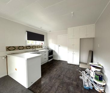 Freshly Updated 2 Bedroom Home Close to Schools and City - Ready Soon! - Photo 1