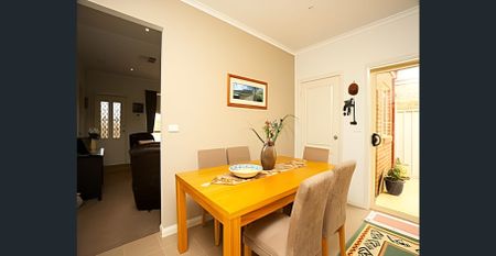 Spacious & Stylish Living with Year-Round Comfort - Photo 2