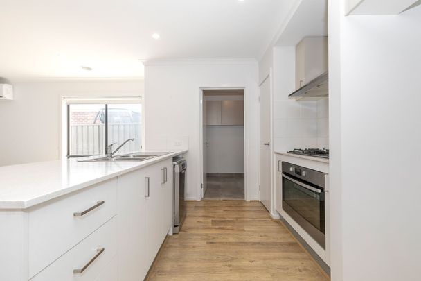 Spacious Family Home with Modern Comforts - Photo 1