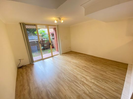 Split Level 2 Bedroom Townhouse With Open Car Space !!! - Photo 1