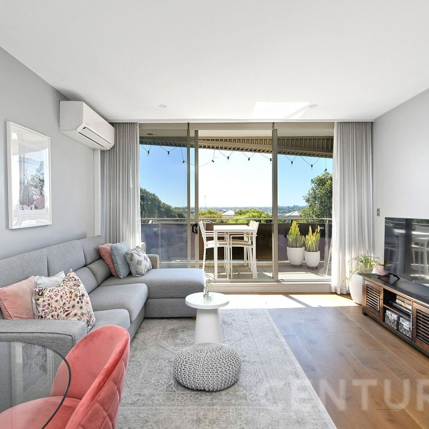 Elevated Luxury with Soaring Ceilings & Water Views - Photo 1
