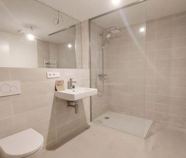 Moderne 1,5-Zi.-Wohnung mit Loggia & Rooftop Wellness - Photo 2