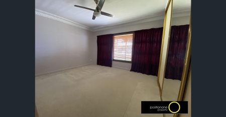 Spacious Family Home with Pool, Entertainer’s Deck & Fully Grassed Yard. - Photo 5