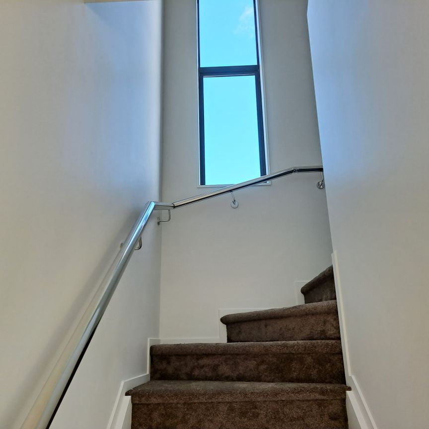 Spacious and Modern Two-Level Home in a Fantastic Location - Photo 1