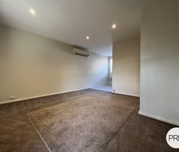 Neat & Convenient 2-Bedroom Unit in a Prime Location - Photo 1