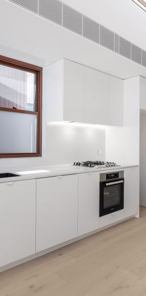 Modern two bedroom unit - 20% below market rent - Photo 1