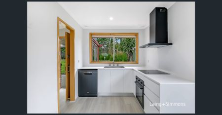 Refreshed brick home with brand new kitchen - Photo 5