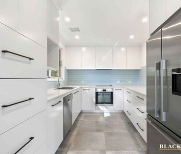 Modern two bedroom home with large private yard - Photo 1