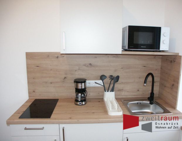 Sutthausen, modernes Apartment mit WohnSchlafraum und integrierter kl. Einbauküche. - Photo 1