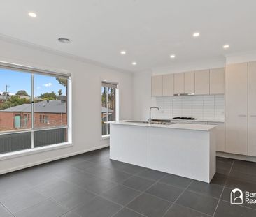 SPACIOUS FOUR-BEDROOM HOME WITH YEAR-ROUND COMFORT - Photo 3
