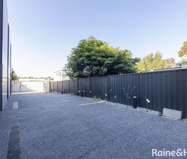 NEWLY BUILT! ARCHITECTURAL TOWNHOUSE IN BRUNSWICK AWAITS YOU - Photo 3