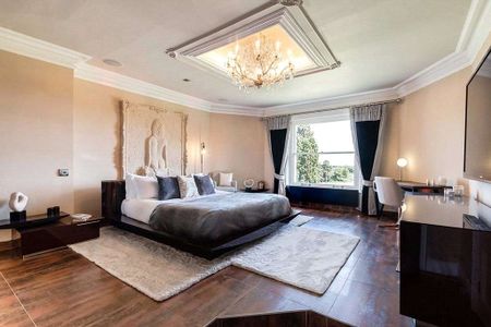 A refurbished character apartment set in a gated development. - Photo 2