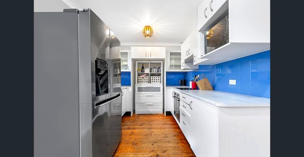 Light-Filled Family Home with Spacious Deck in a Top School Catchment! - Photo 1