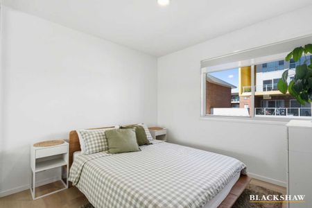 Top-Floor Living with Style, Space and Superb Convenience - Photo 4