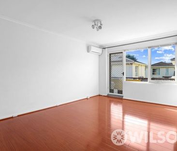 Sunny, spacious living in a lively hub! - Photo 1