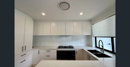 Welcome home to this beautifully renovated residence This home offers comfort, style, and practicality for everyday living. - Photo 4