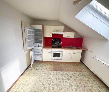 Gemütliche Dachgeschosswohnung mit Küche - Foto 4