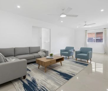 Stylishly Refreshed Family Home on a Premium Block in a Sought-Afte... - Photo 2