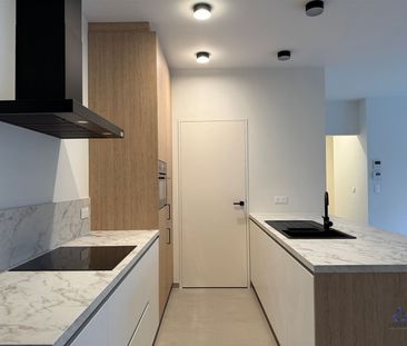 Energiezuinige nieuwbouwappartement met garagebox en gemeenschappel... - Photo 4