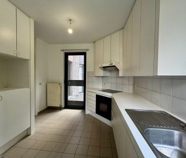 Gelijkvloers appartement met 1 slaapkamer, terras en garagebox - Photo 4