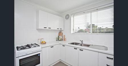 A Peak inside is all you need…To verify this beautifully presented unit is what you have been looking for! - Photo 2