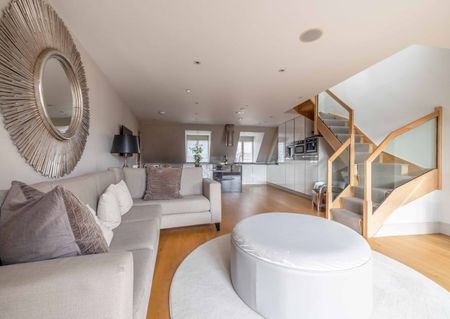 Elevate your lifestyle in this unique residence where modern sophistication meets historic charm. - Photo 2