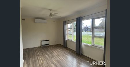 Neat and Tidy 3 Bedroom Home - Photo 3