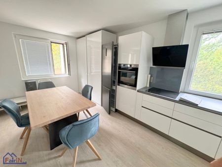 Moderne 2-Zimmer Wohnung mit Kamin und Fußbodenheizung in begehrter Lage des 13. Bezirkes - Photo 5