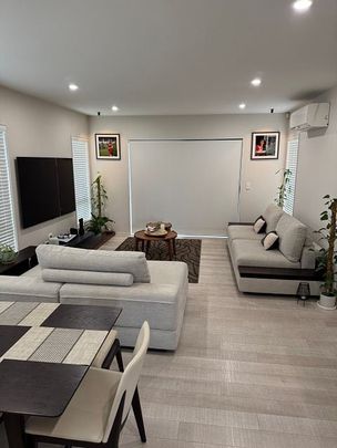 Charming 4BR house in Karaka Lakes - Photo 1