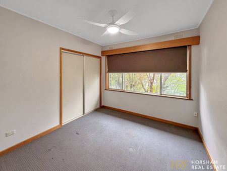 Modern 4-Bedroom Home Near the River - Photo 2