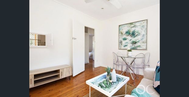 Open the Door to Peaceful Living in a Leafy Creekside Setting - Photo 1