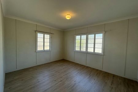 THIS BEAUTIFUL QUEENSLANDER IS AVAILABLE NOW - NEW FLOORING INSTALLED THROUGH OUT! - Photo 2
