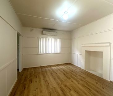 RENOVATED THREE BEDROOM HOUSE - Photo 1