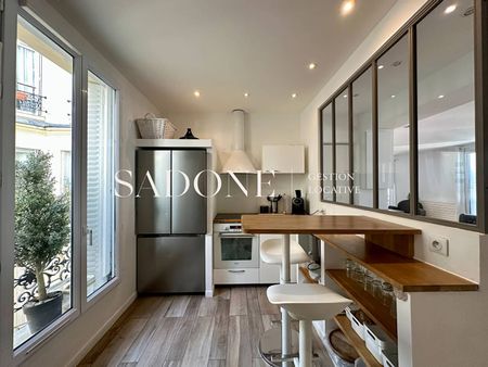 Location Appartement 4 pièces 151,45 m² à Neuilly-sur-Seine - Photo 2