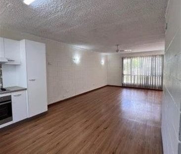 CHARMING UNIT IN PERFECT LOCATION - Photo 1