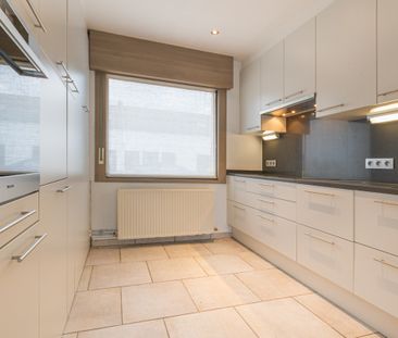 Instapklare woning met zuid gelegen tuintje. - Foto 1