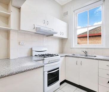 Two Bedroom Duplex Masterpiece Offering Convenience - Photo 5