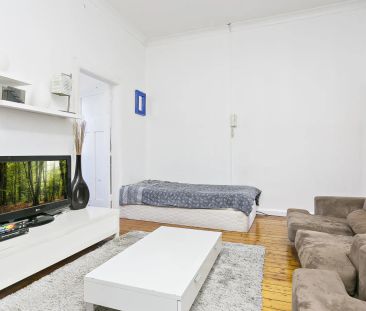 Fully Furnished Top Floor Apartment - Photo 3