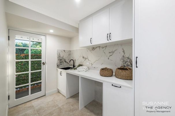 Stylish Family Home with Pool, Multiple Living Areas & Stunning Outdoor Spaces - Photo 1